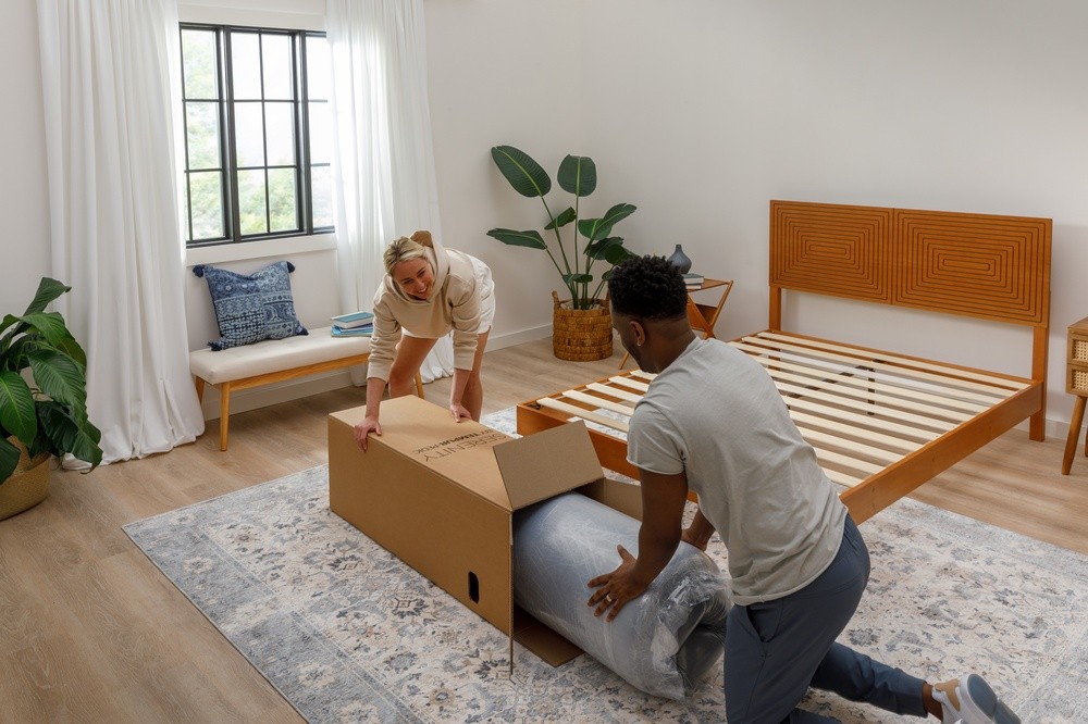 Couple unboxing Serenity Mattress